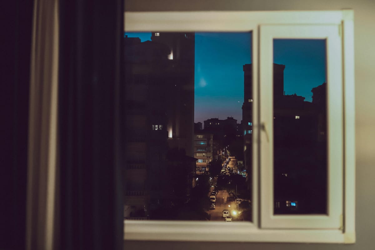 A view through a window at evening.