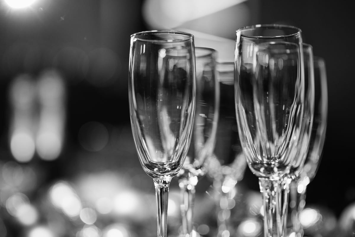 A champagne flute on a celebration table.