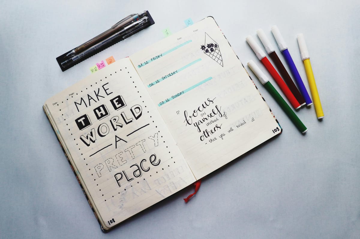 A weekly planner with handwritten entries.