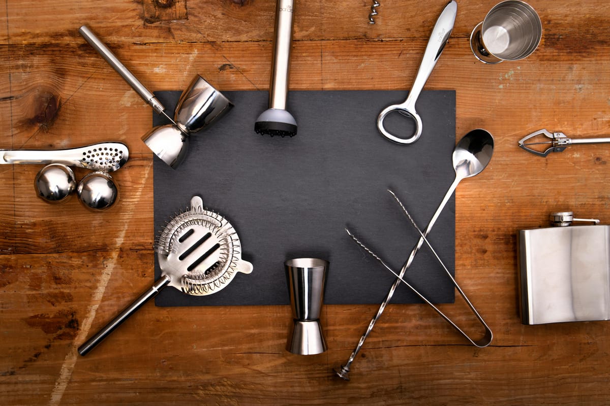 A stainless steel measuring jigger.