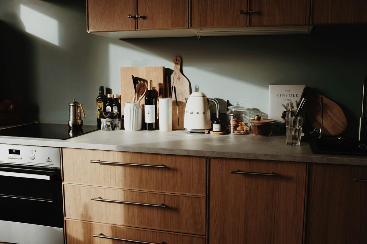 A takeaway container on a kitchen counter in morning light.