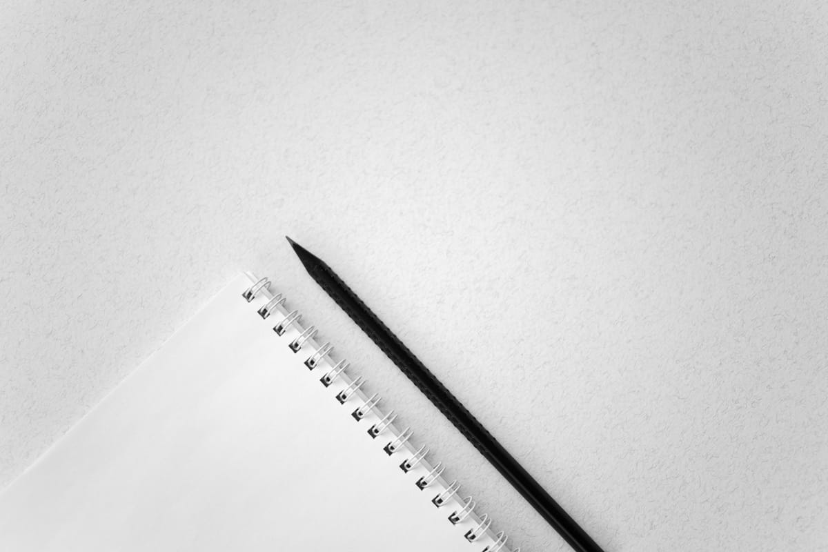 A single injection pen on a plain surface.