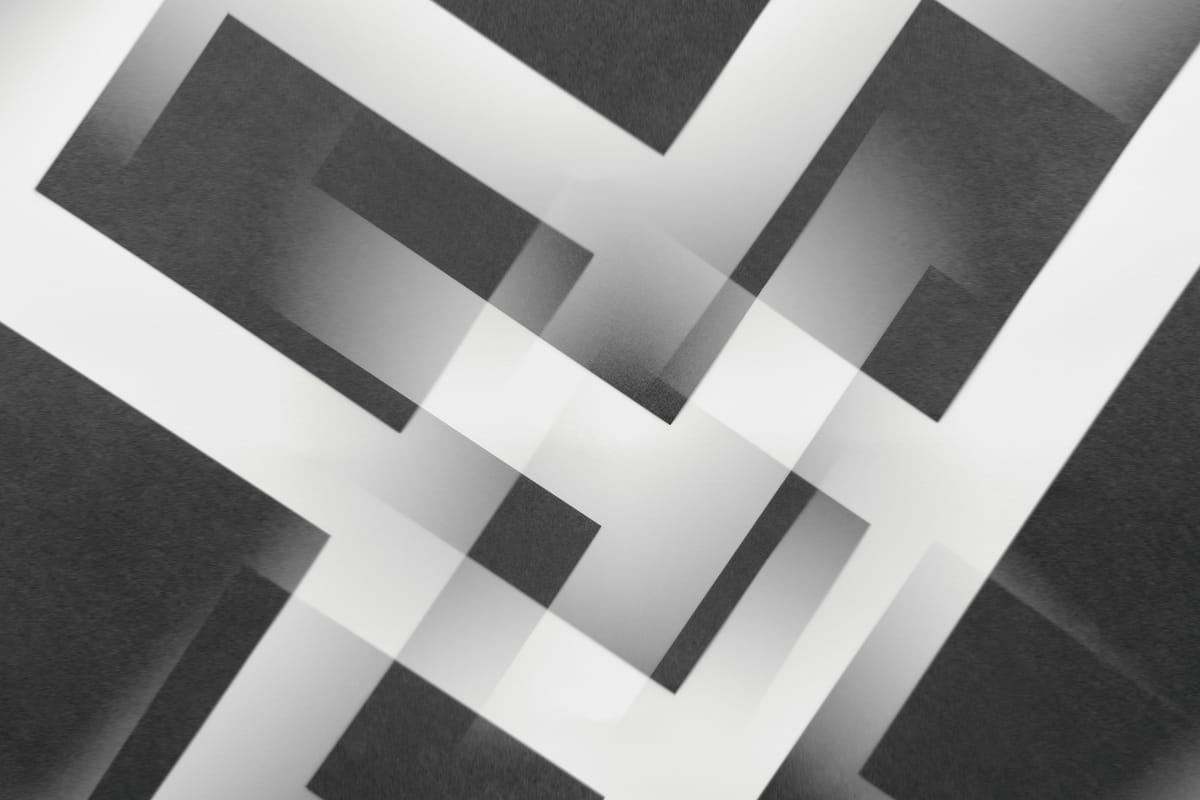 An abstract image of two overlapping paths.