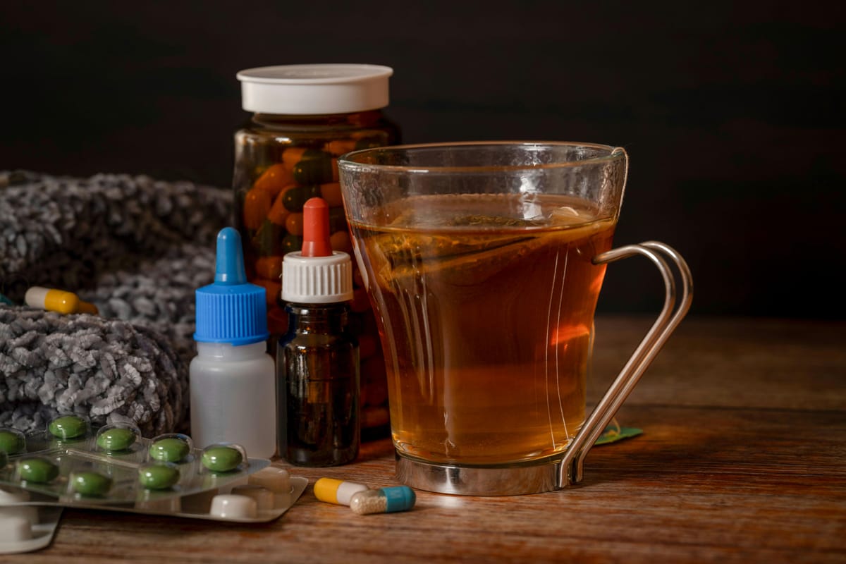 Various herbal supplement bottles on a wooden table.