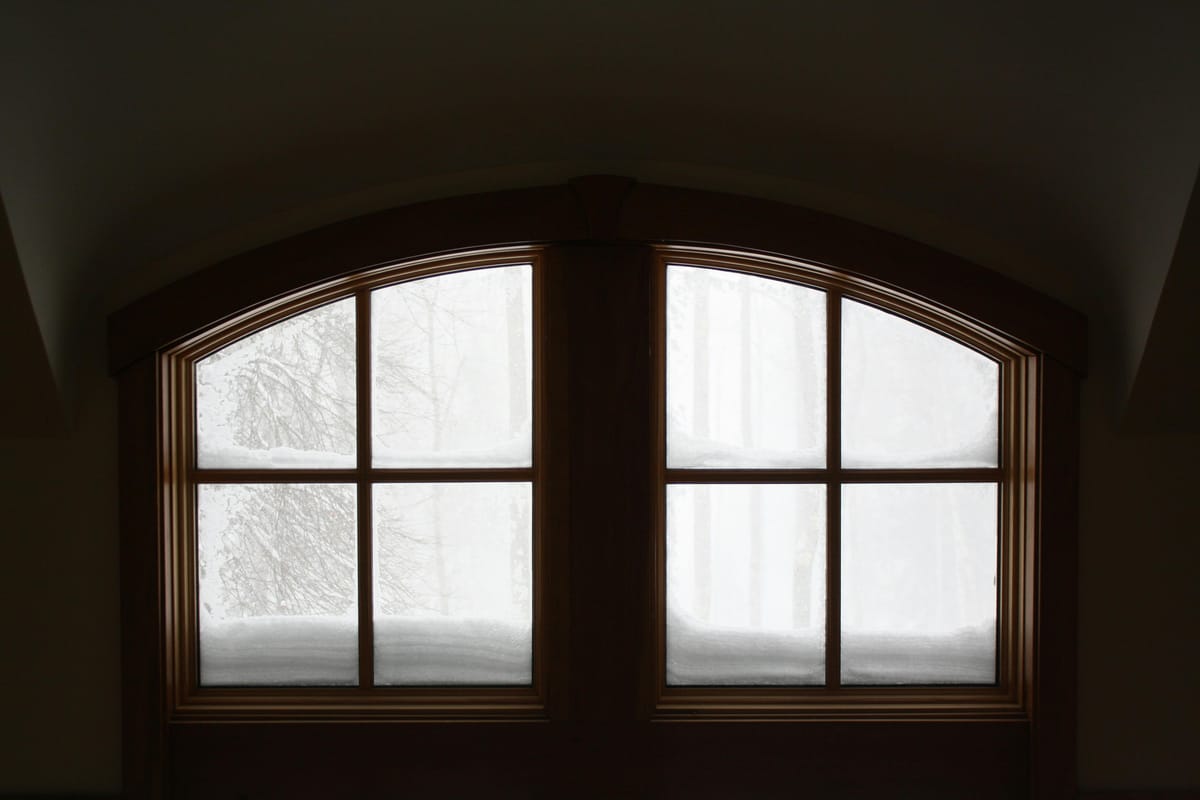 A frosty winter window with morning light.